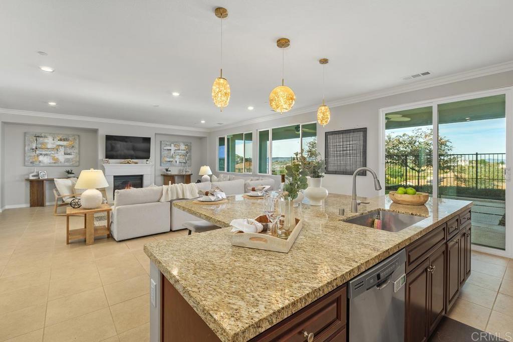 33802 Edge Lane Temecula, CA 92592 - Photo 13 of 31 a living room with fireplace furniture and a large window