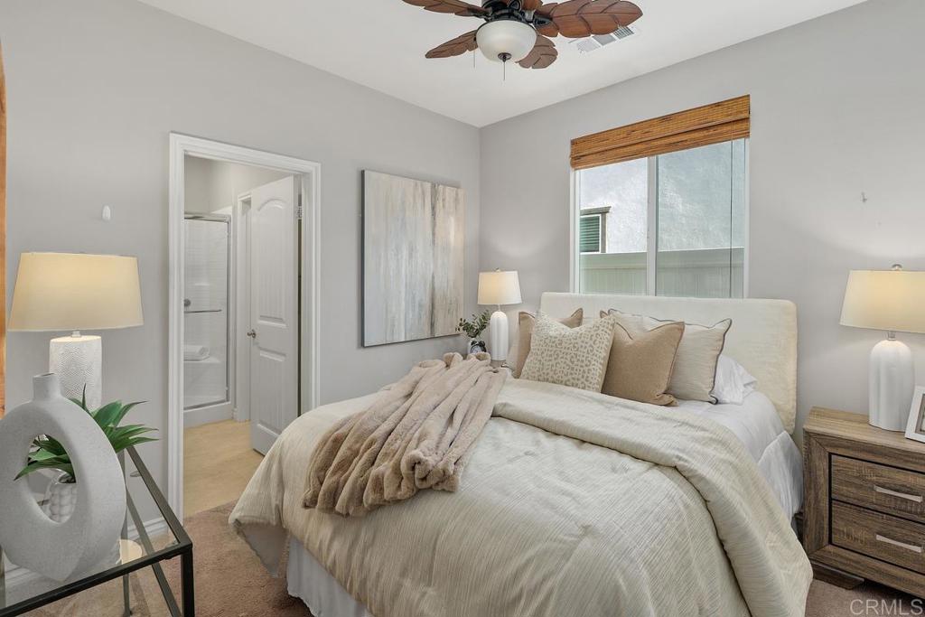 33802 Edge Lane Temecula, CA 92592 - Photo 14 of 31 a bed room with a bed and a lamp