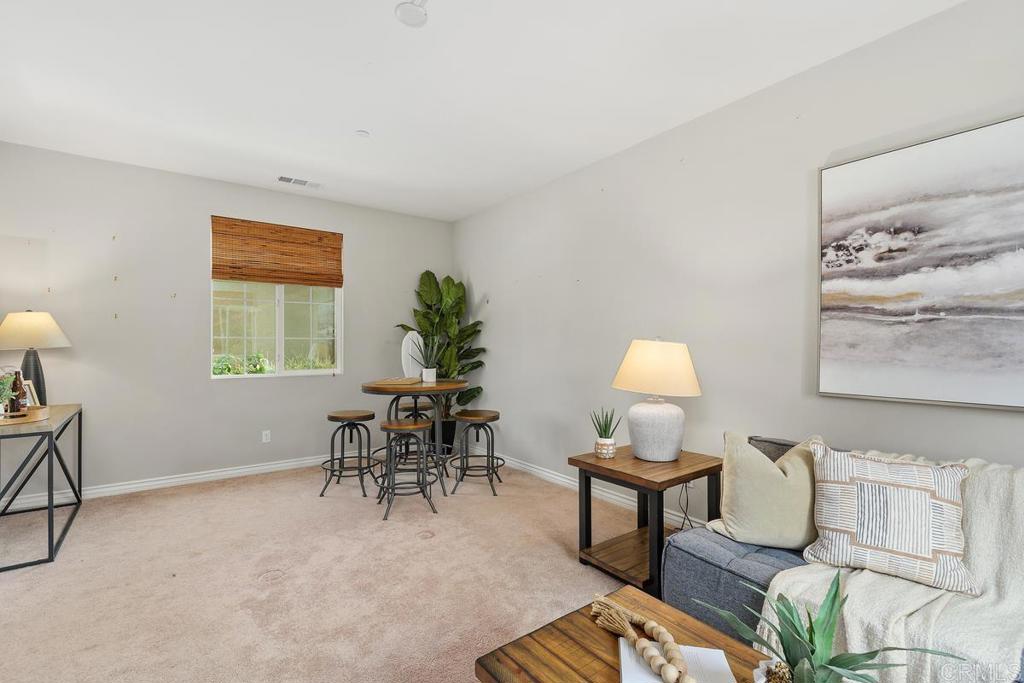 33802 Edge Lane Temecula, CA 92592 - Photo 19 of 31 a living room with furniture and a window