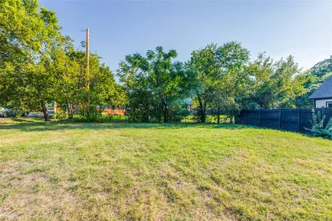 a view of outdoor space with deck and garden