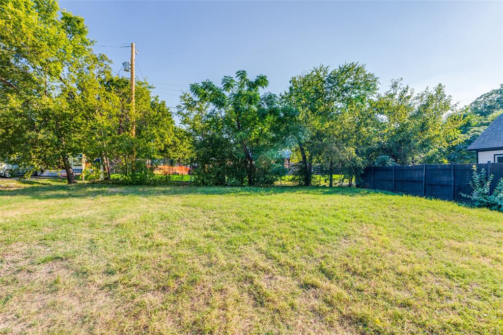 a view of outdoor space with deck and garden