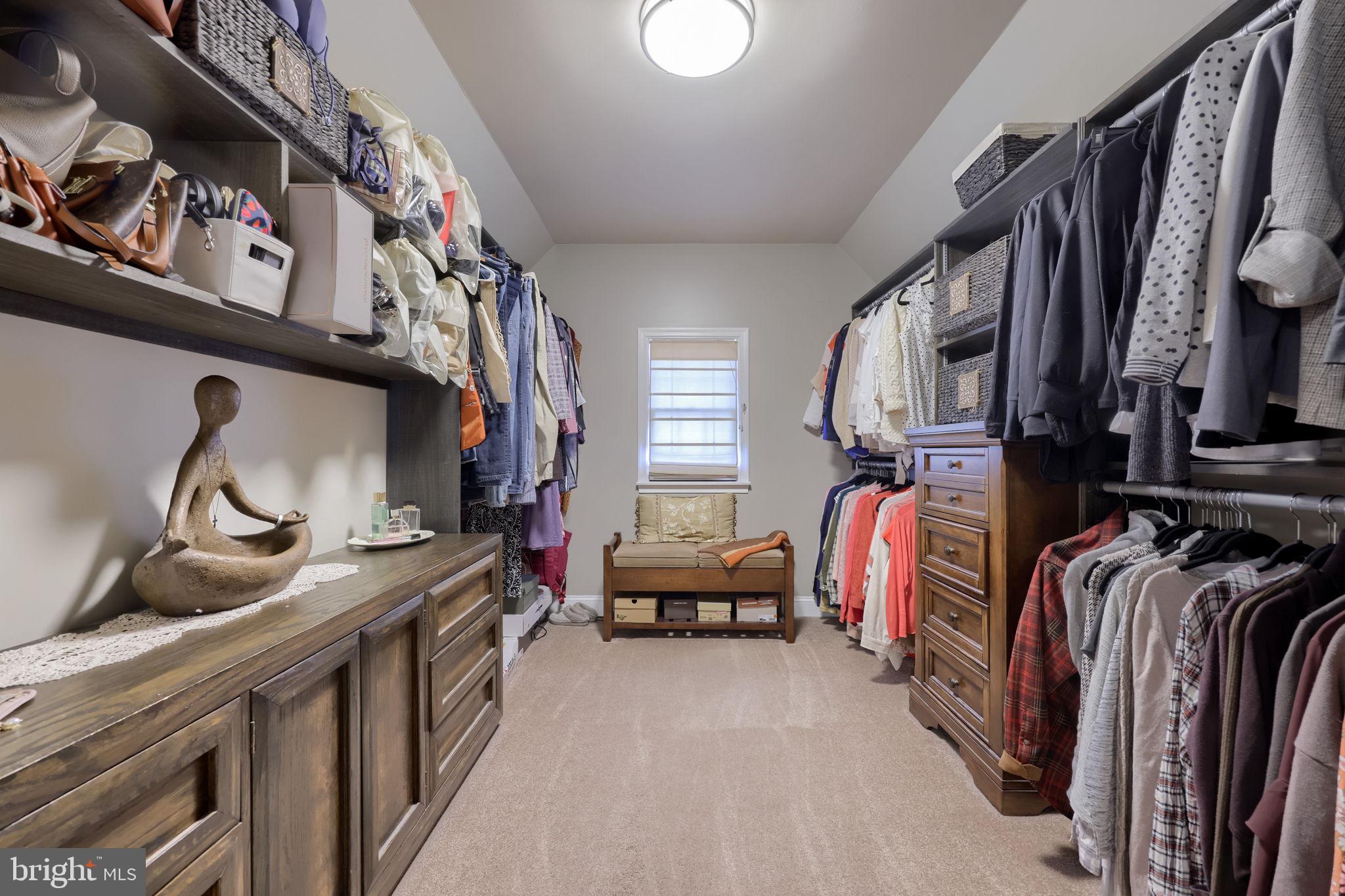 4972 Farmington Road Harrisburg, PA 17112 - Photo 27 of 57 a view of walk in closet with clothes and shoes