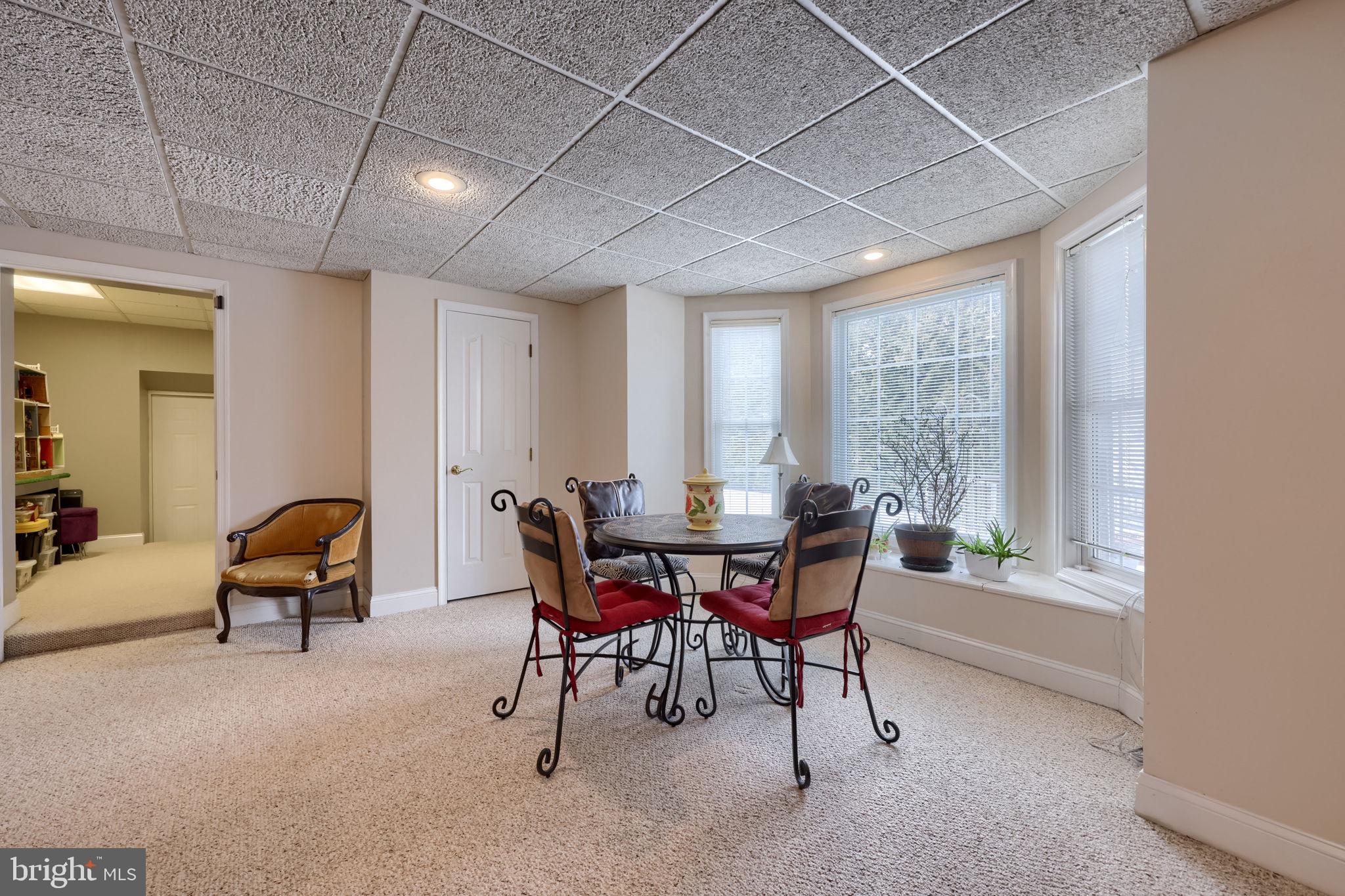 4972 Farmington Road Harrisburg, PA 17112 - Photo 42 of 57 a dining room with furniture and wooden floor
