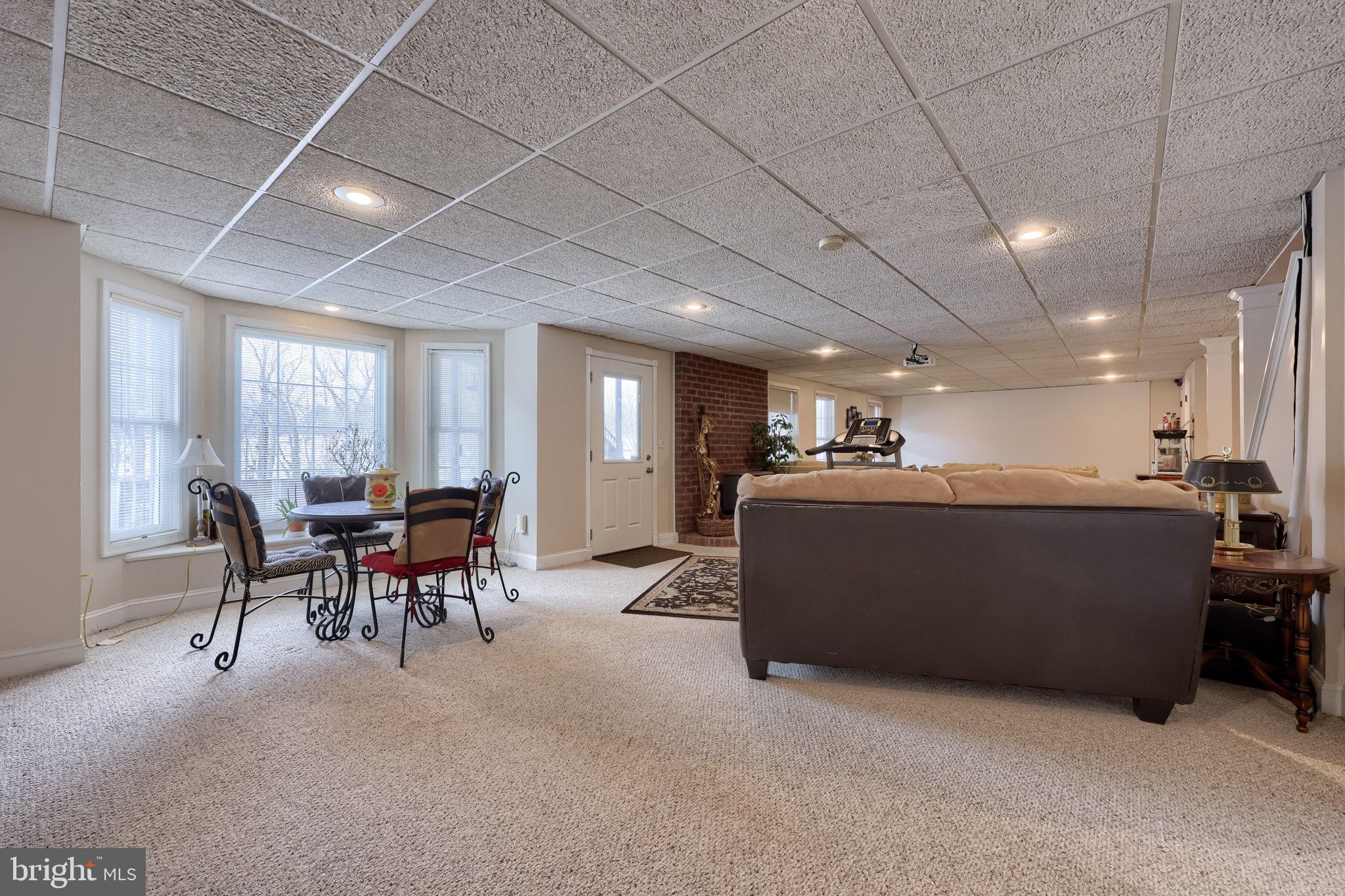 4972 Farmington Road Harrisburg, PA 17112 - Photo 43 of 57 a lobby with furniture and a table