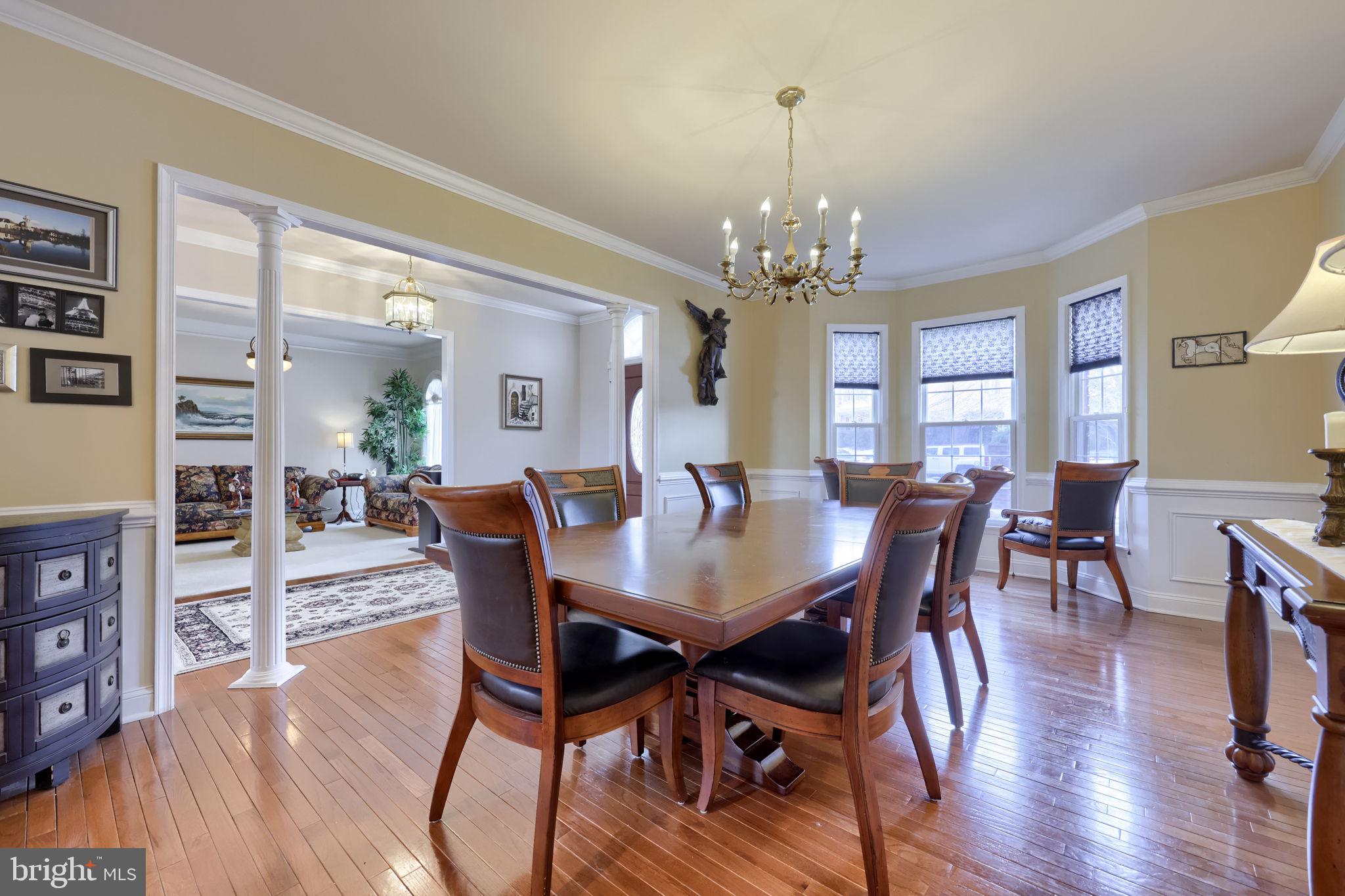4972 Farmington Road Harrisburg, PA 17112 - Photo 6 of 57 a view of a dining room with furniture and wooden floor