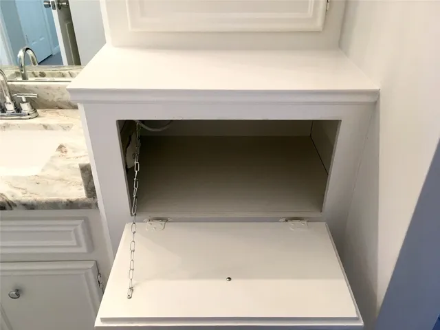 a view of a swimming pool with sitting area