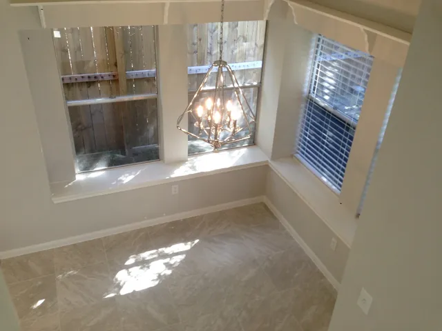 a view of kitchen with windows