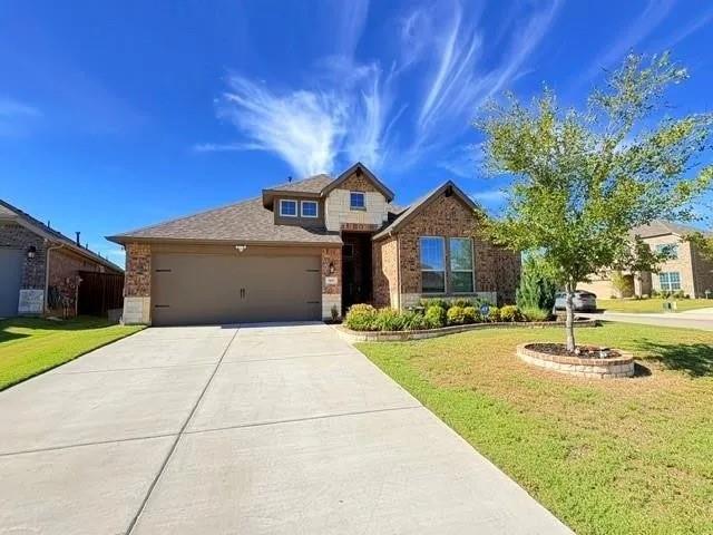 809 Elizabeth Street Anna, TX 75409 - Photo 3 of 13 a front view of a house with a yard