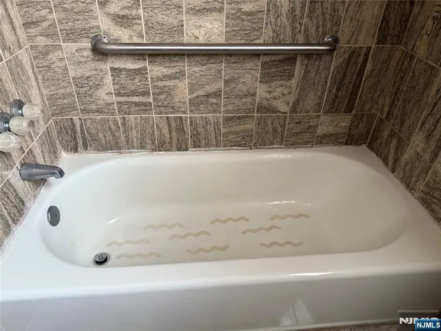 a bathroom with a bathtub