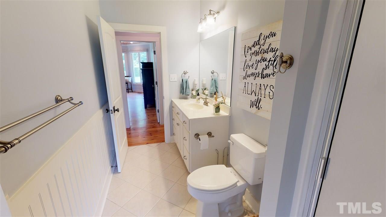 3509 Bahama Road Rougemont, NC 27572 - Photo 14 of 30 a bathroom with a sink toilet and shower
