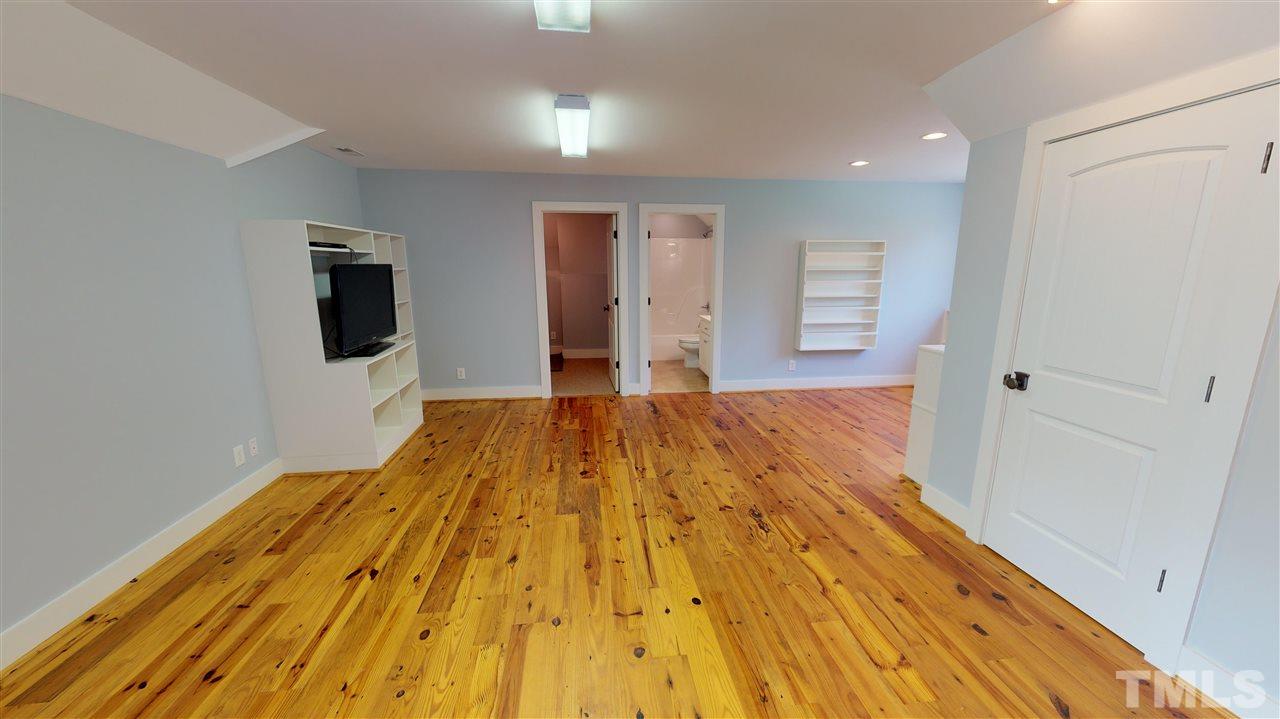 3509 Bahama Road Rougemont, NC 27572 - Photo 18 of 30 a view of a room with wooden floor and glass door