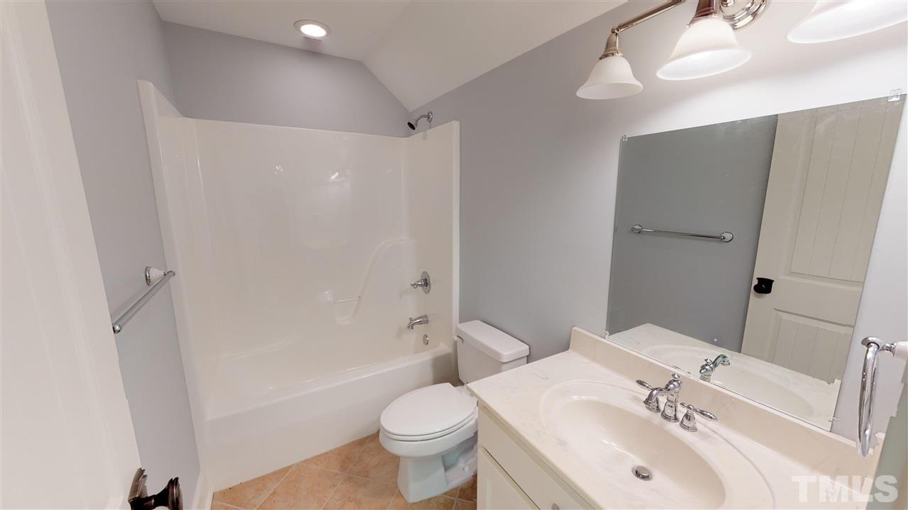 3509 Bahama Road Rougemont, NC 27572 - Photo 20 of 30 a bathroom with a sink toilet and shower