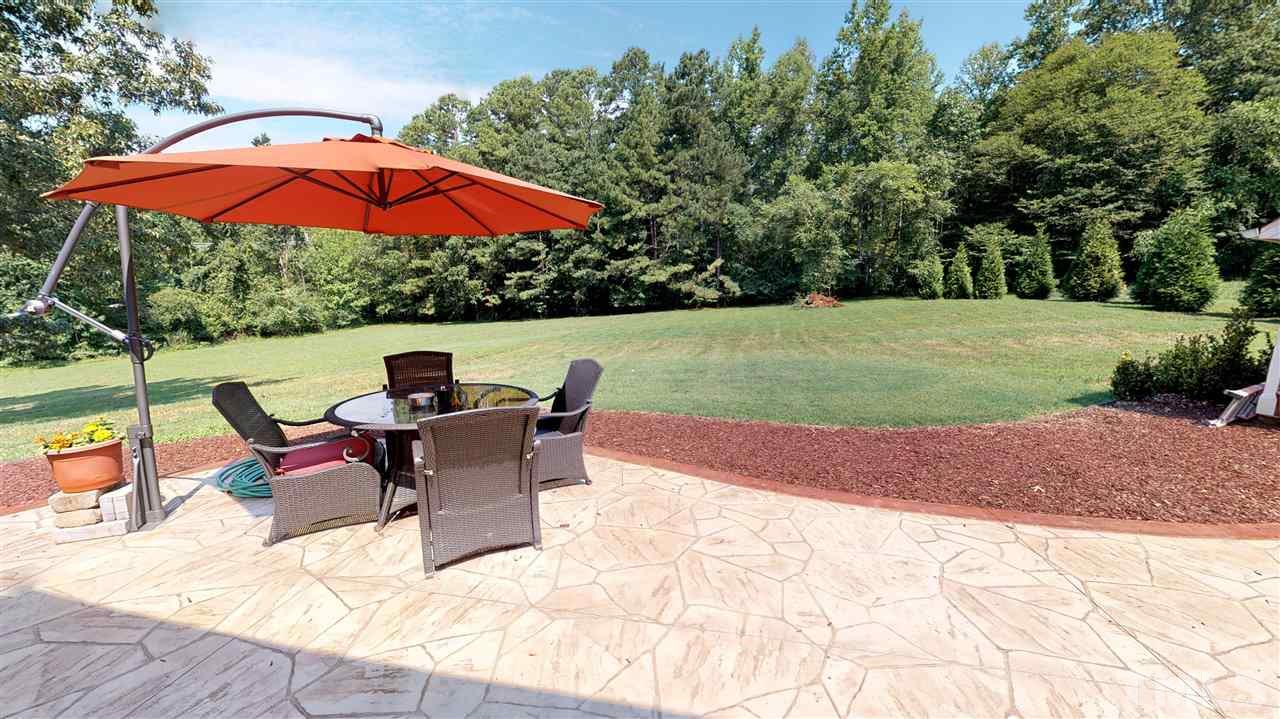 3509 Bahama Road Rougemont, NC 27572 - Photo 23 of 30 a patio with a yard table and chairs