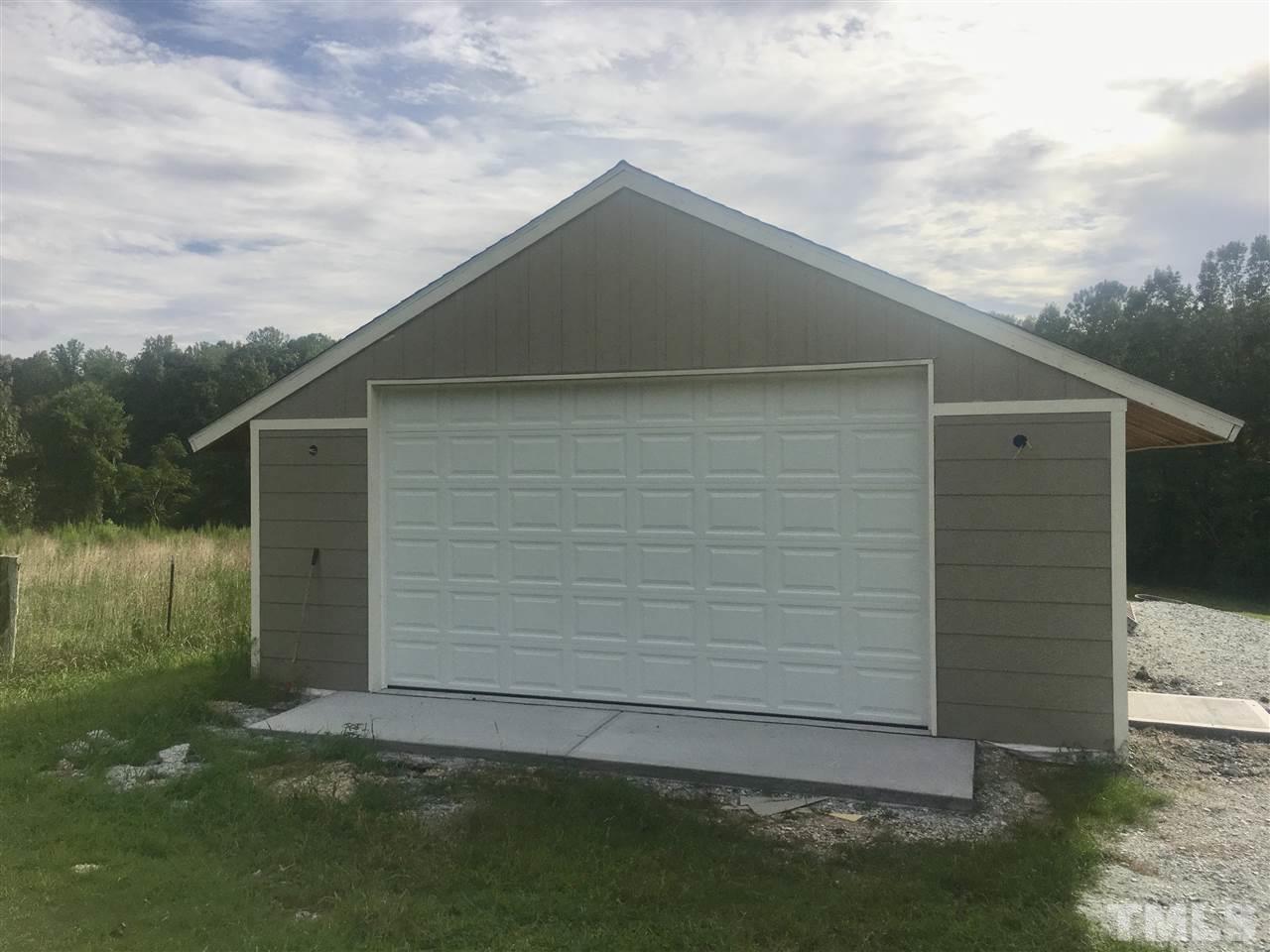 3509 Bahama Road Rougemont, NC 27572 - Photo 27 of 30 a backyard of a house with lots of green space