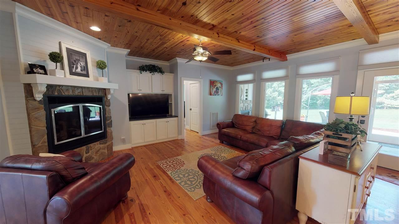 3509 Bahama Road Rougemont, NC 27572 - Photo 7 of 30 a living room with furniture and a fireplace
