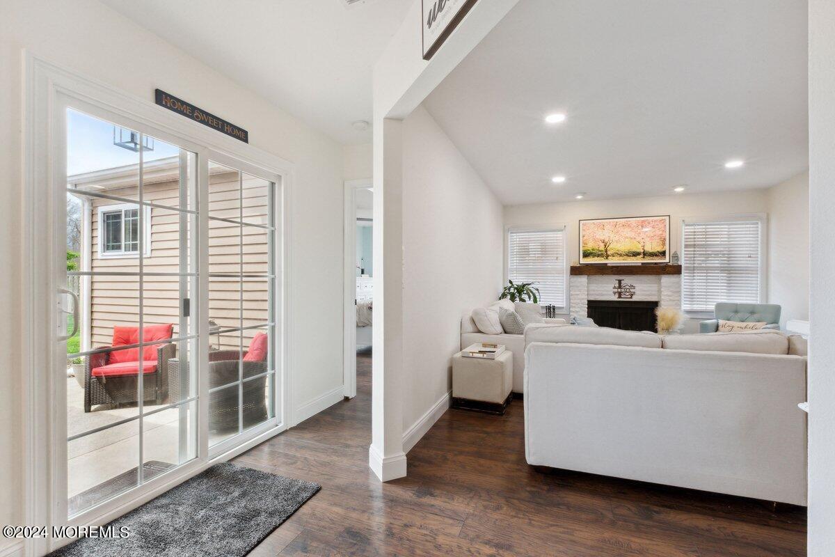 2 Concord Circle Howell, NJ 07731 - Photo 20 of 24 a living room with furniture and a fireplace