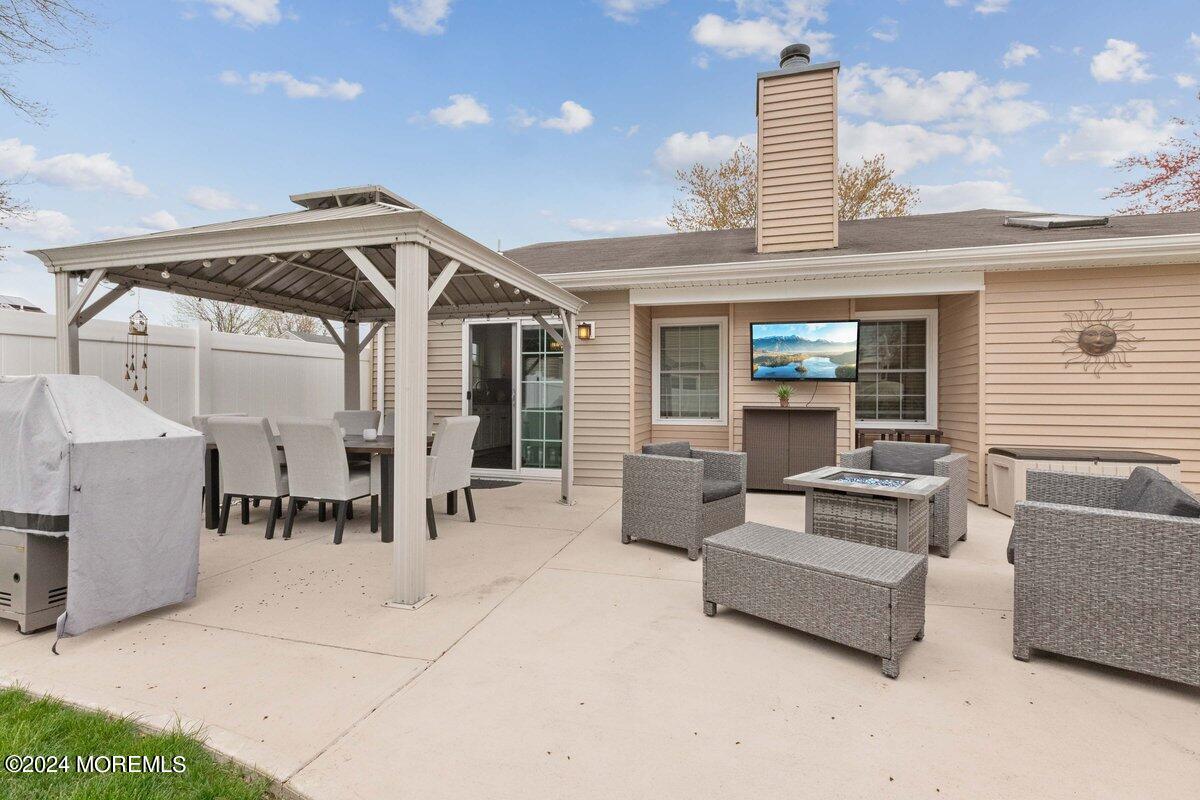 2 Concord Circle Howell, NJ 07731 - Photo 21 of 24 a view of living room and balcony with furniture