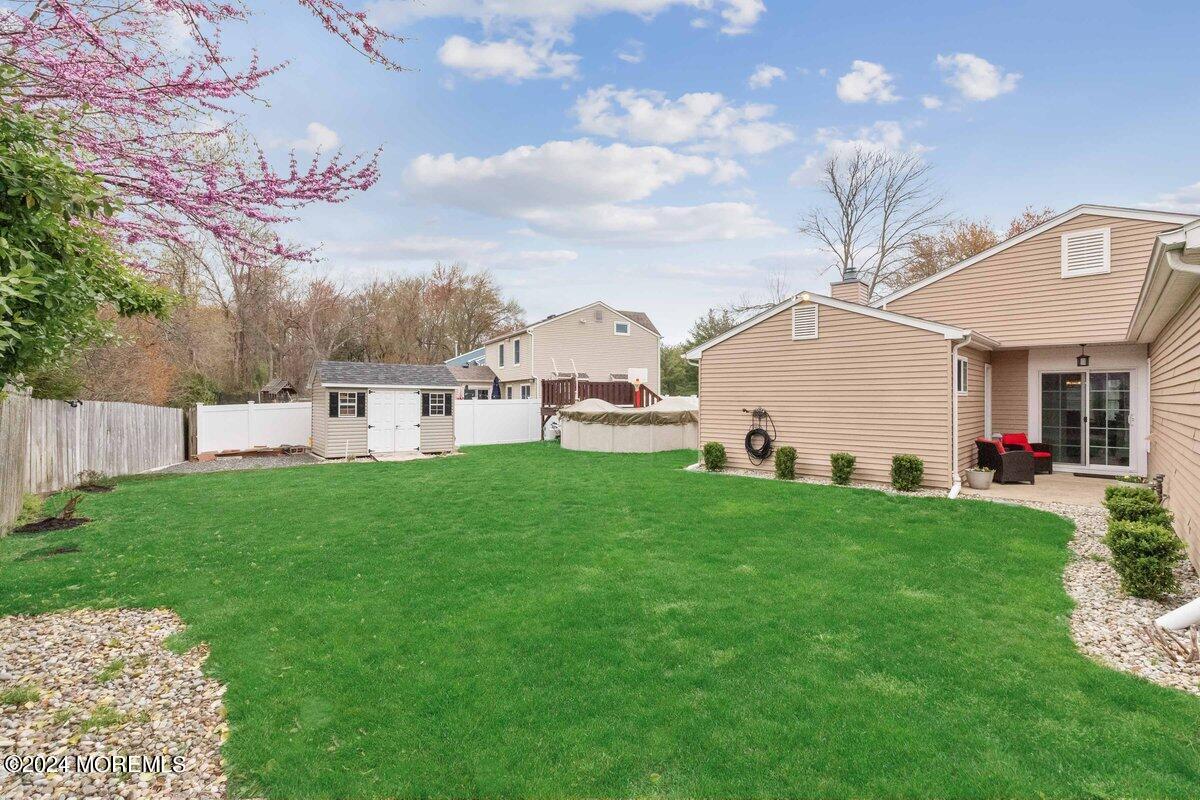 2 Concord Circle Howell, NJ 07731 - Photo 23 of 24 a view of a house with a yard