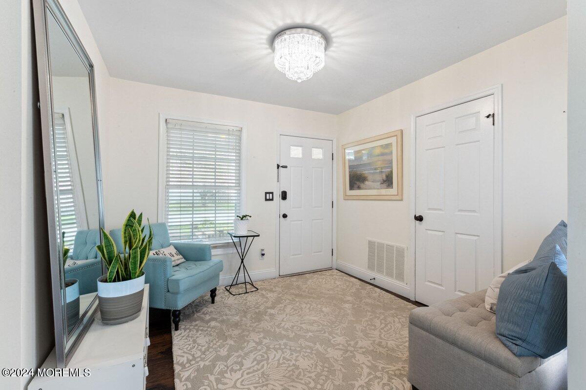 2 Concord Circle Howell, NJ 07731 - Photo 4 of 24 a living room with furniture flowerpot and window