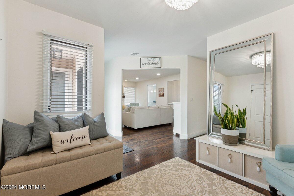 2 Concord Circle Howell, NJ 07731 - Photo 5 of 24 a living room with furniture and a large window