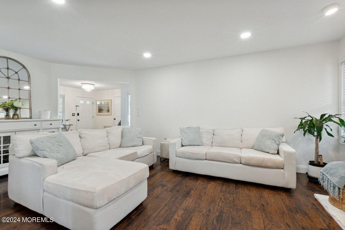 2 Concord Circle Howell, NJ 07731 - Photo 8 of 24 a living room with furniture and wooden floor