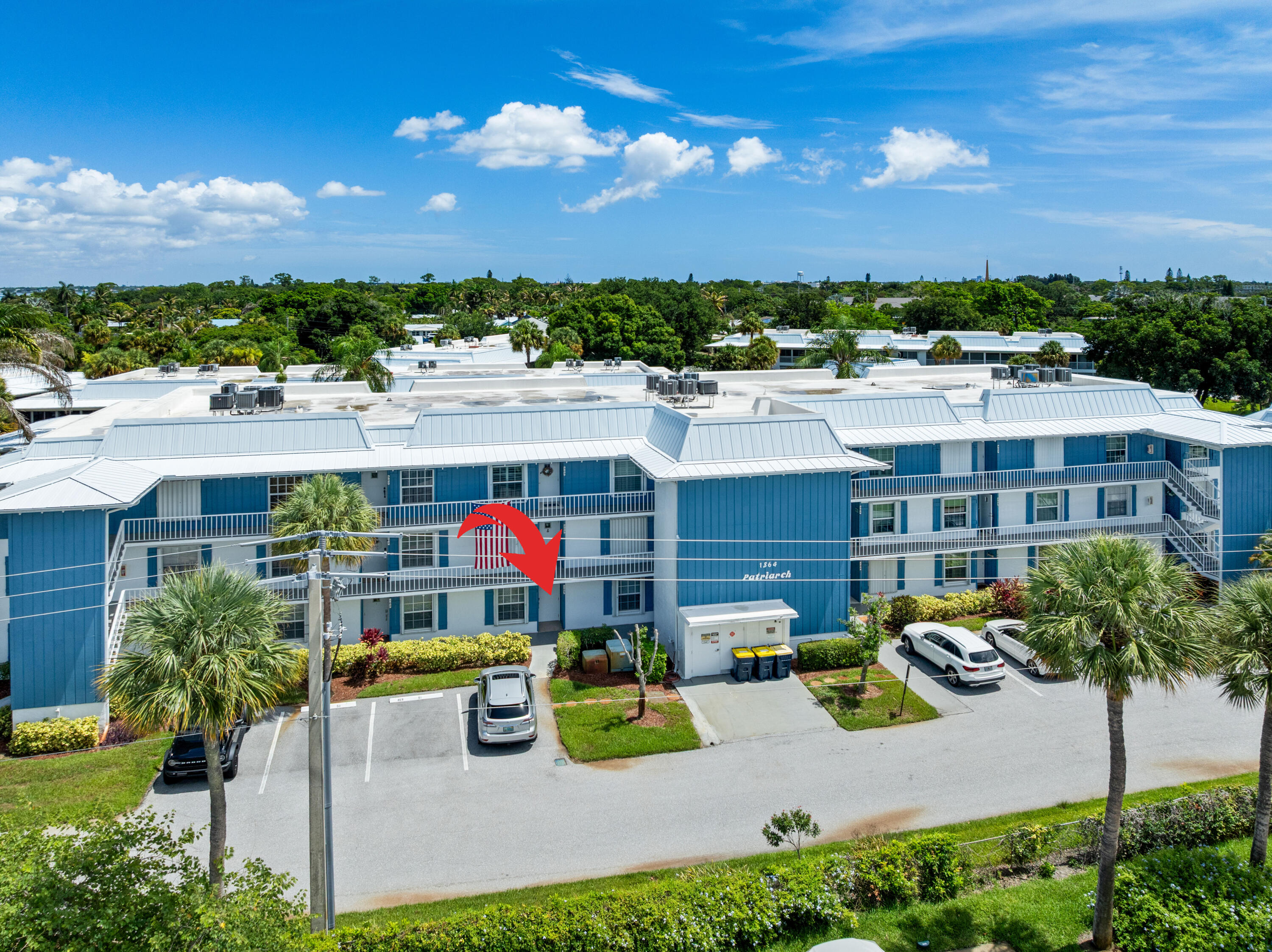 1864 Southwest Palm City Road, Unit 103 Stuart, FL 34994 - Photo 2 of 44 DJI_0957_Arrow