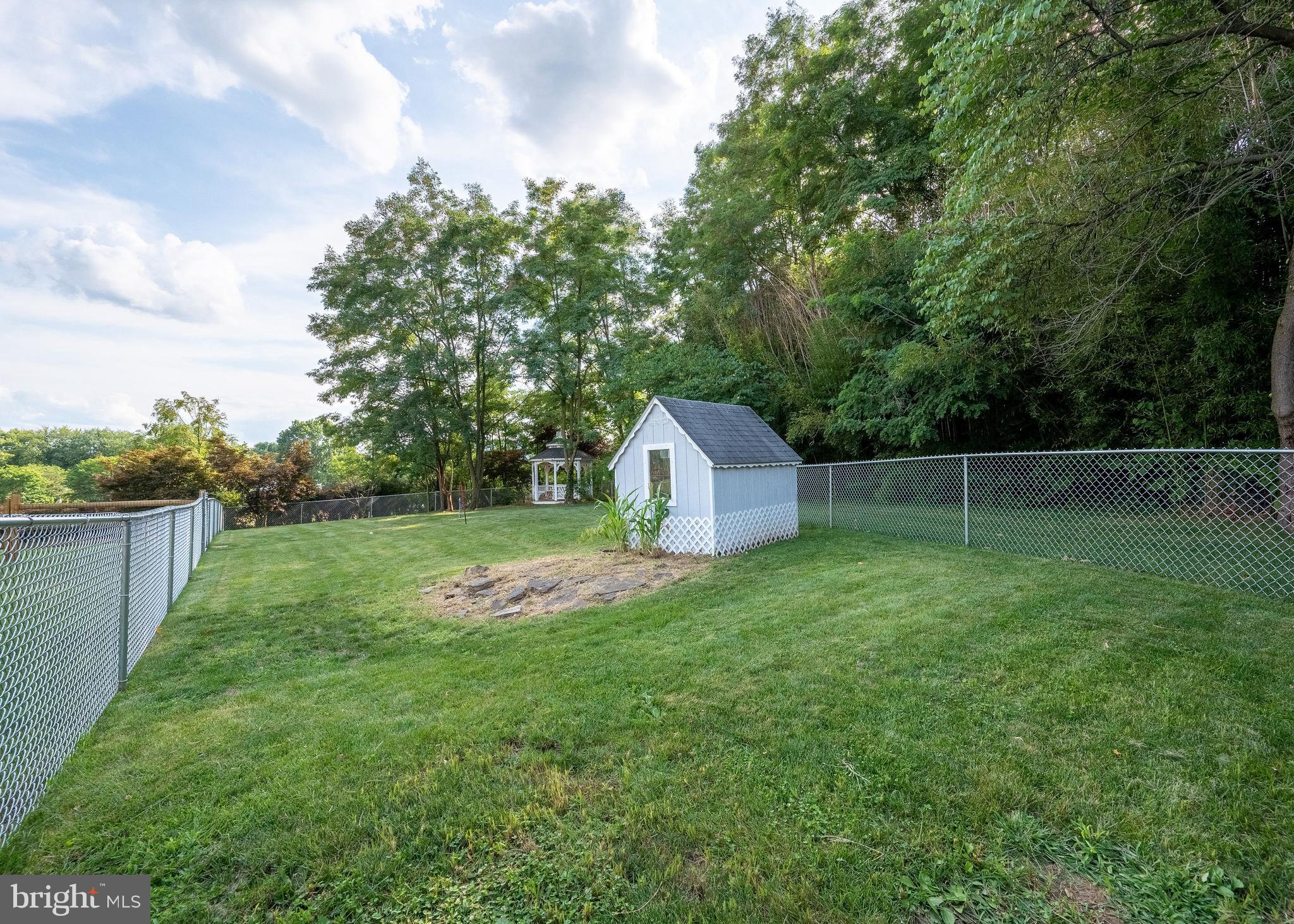 4960 Hafer Road Reading, PA 19606 - Photo 73 of 88 Fenced yard of cottage with gazebo and dog house