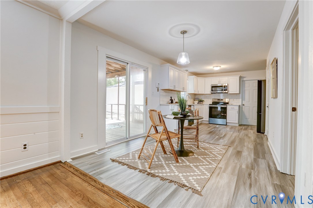 661 Greencastle Road Chesterfield, VA 23236 - Photo 8 of 28 a view of a dining room with furniture window and wooden floor