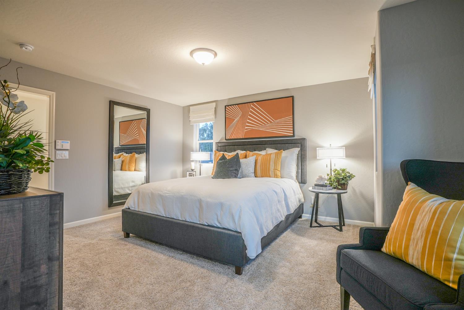 2329 North Raleigh Drive Fresno, CA 93727 - Photo 17 of 25 a bedroom with a bed and a couch