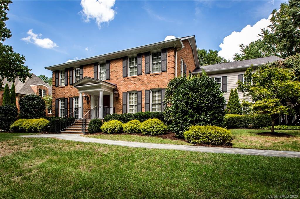 2930 Wheelock Road Charlotte, NC 28211 - Photo 2 of 48 a front view of a house with a yard