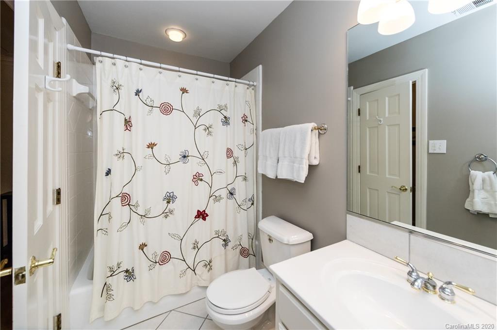 2930 Wheelock Road Charlotte, NC 28211 - Photo 38 of 48 a bathroom with a sink and toilet