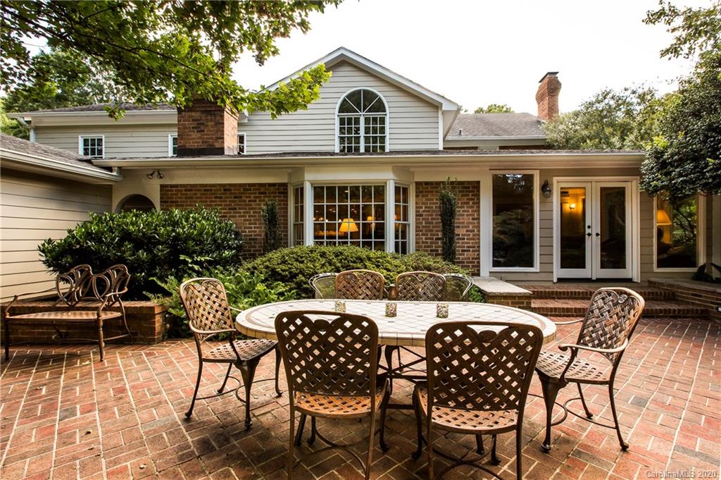 2930 Wheelock Road Charlotte, NC 28211 - Photo 43 of 48 a view of a house with backyard sitting area and furniture