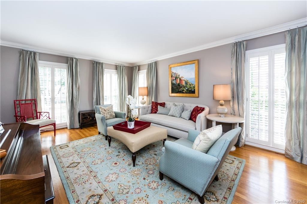 2930 Wheelock Road Charlotte, NC 28211 - Photo 7 of 48 a living room with furniture and a wooden floor