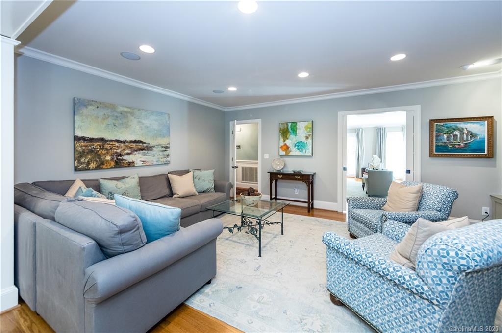 2930 Wheelock Road Charlotte, NC 28211 - Photo 9 of 48 a living room with furniture and a wooden floor