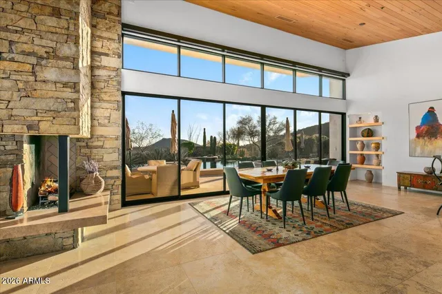 a bedroom with furniture and a flat screen tv