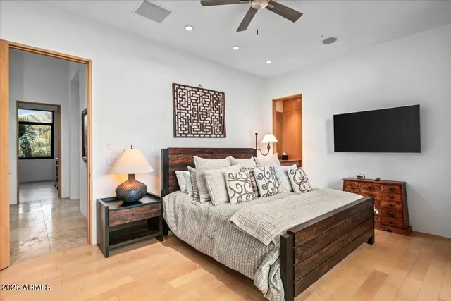a living room with fireplace furniture and a flat screen tv