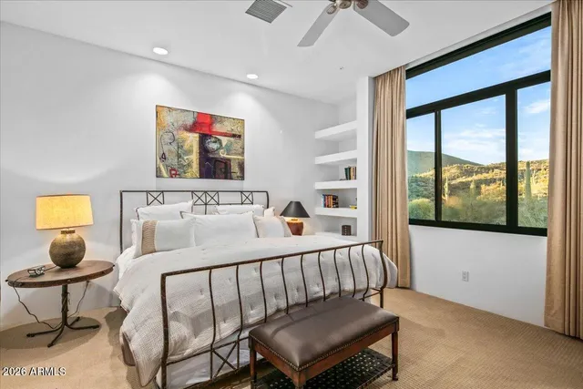 a view of swimming pool with a couches and chairs