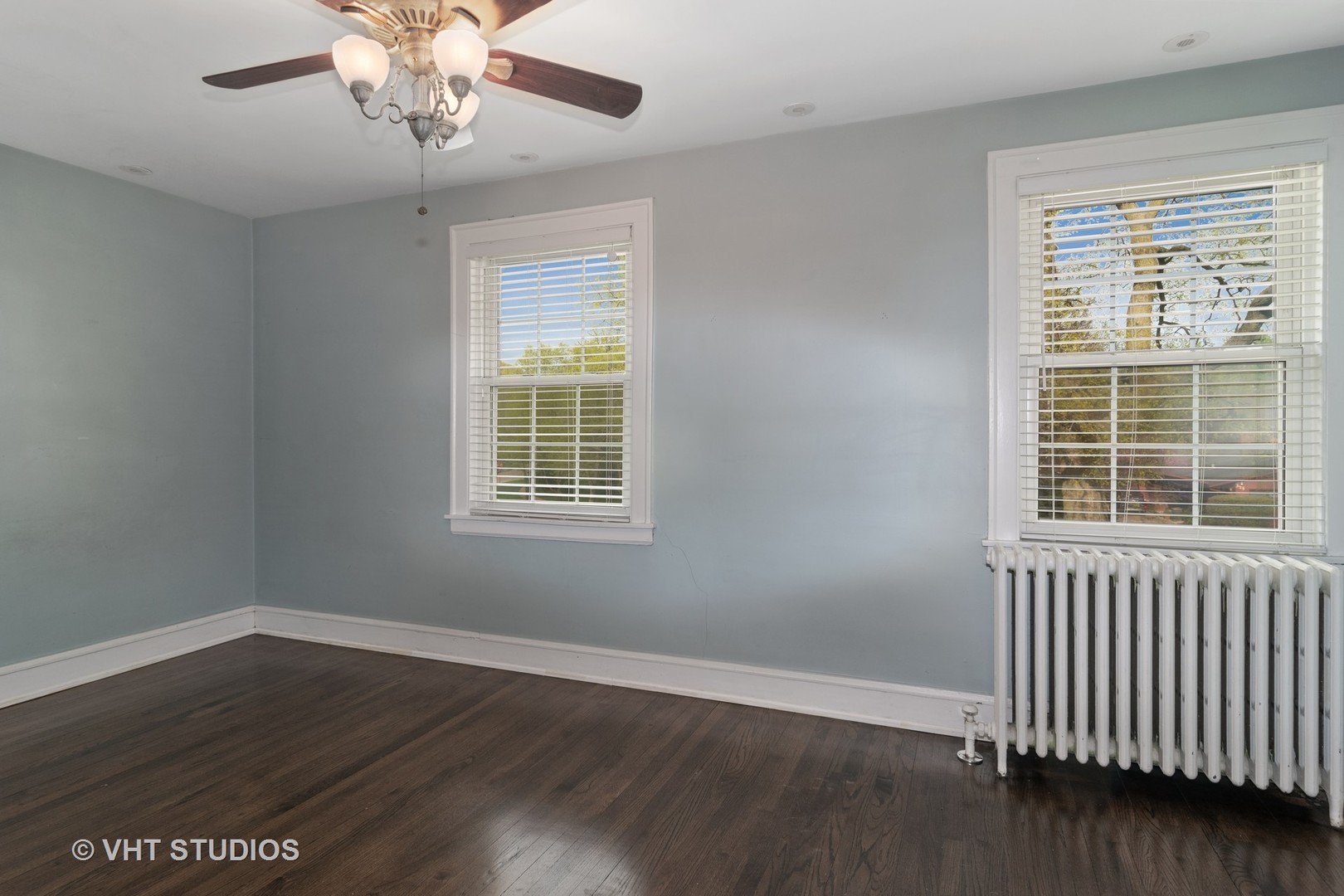 376 Bartram Road Riverside, IL 60546 - Photo 11 of 15 a view of an empty room with wooden floor and a window