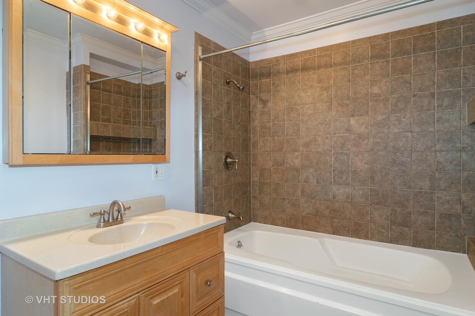 376 Bartram Road Riverside, IL 60546 - Photo 13 of 15 a bathroom with a sink and a bathtub