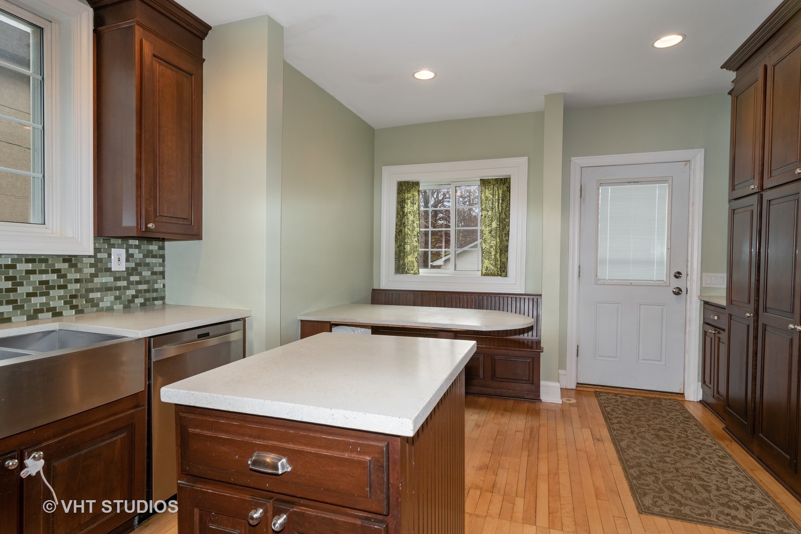 376 Bartram Road Riverside, IL 60546 - Photo 6 of 15 a kitchen that has a sink and a stove in it