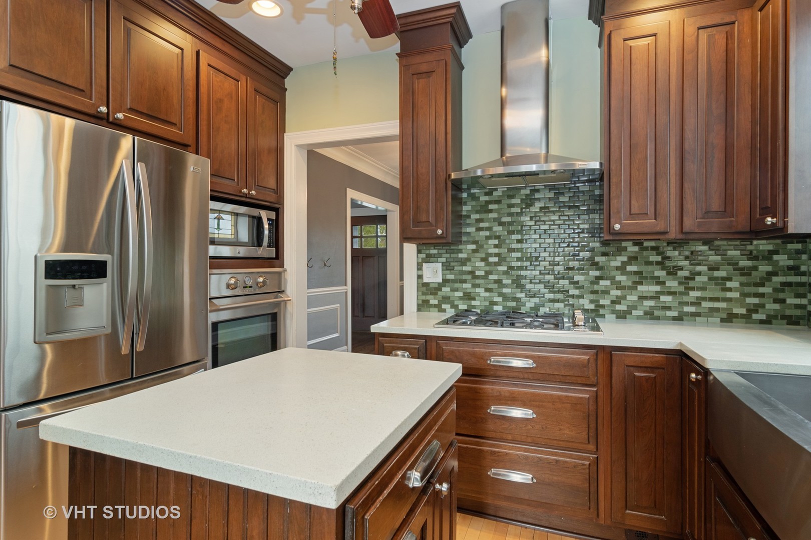 376 Bartram Road Riverside, IL 60546 - Photo 7 of 15 a kitchen with stainless steel appliances a refrigerator and a sink