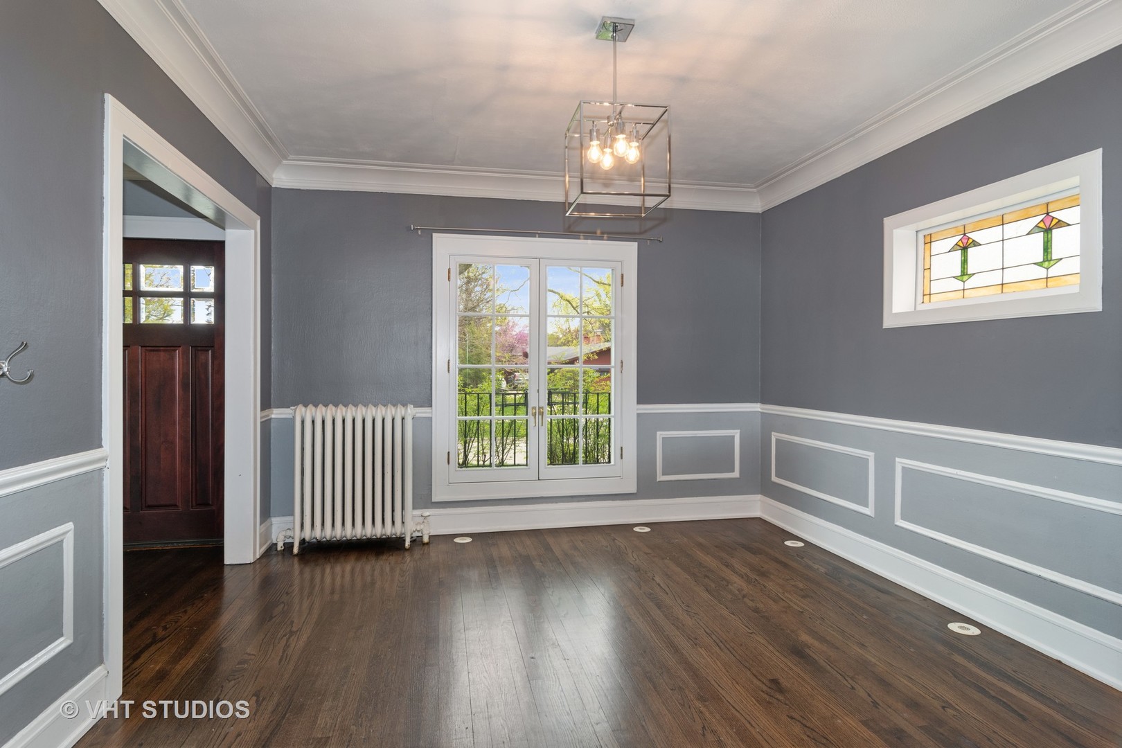 376 Bartram Road Riverside, IL 60546 - Photo 8 of 15 a view of an empty room with wooden floor and a window