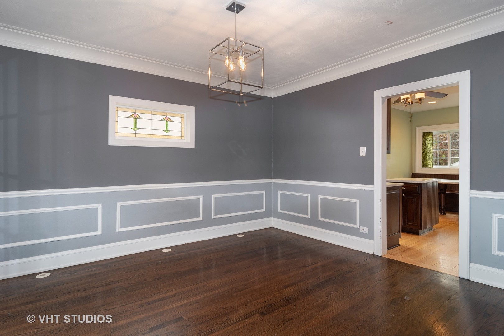 376 Bartram Road Riverside, IL 60546 - Photo 9 of 15 a view of an empty room with wooden floor and a window