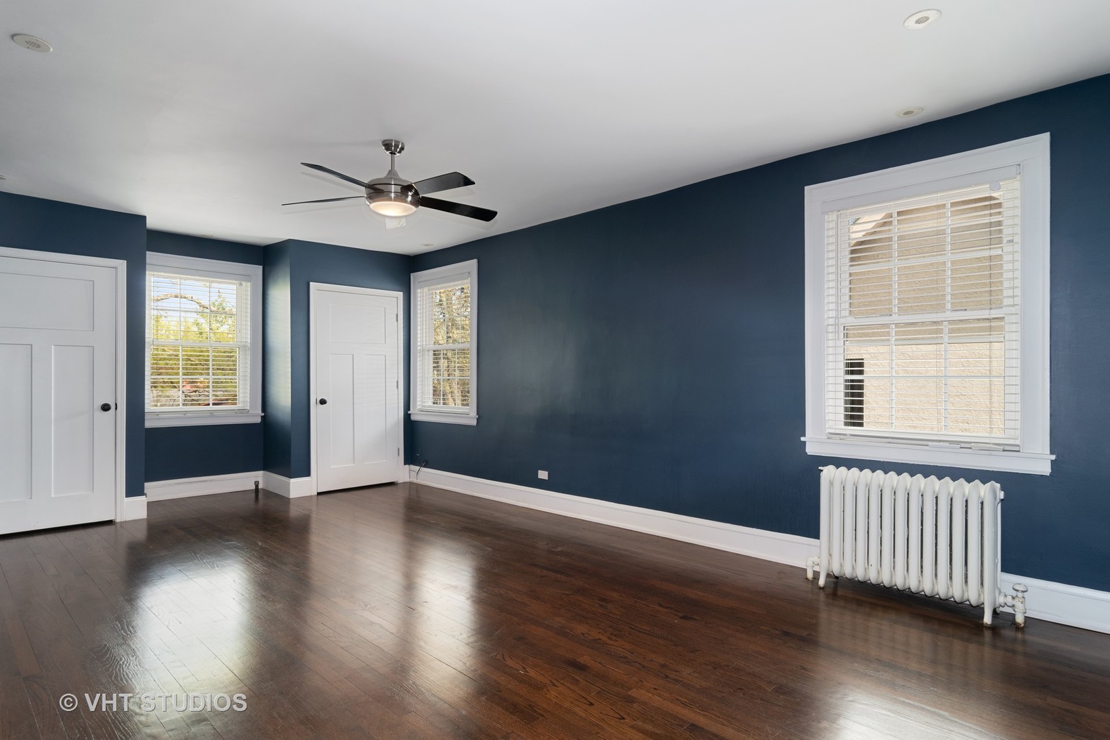 376 Bartram Road Riverside, IL 60546 - Photo 10 of 15 an empty room with wooden floor and windows