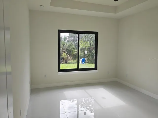 an empty room with windows