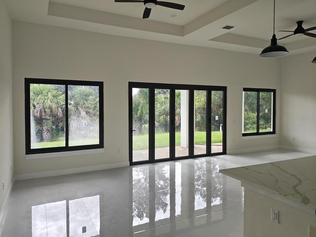 267 Santa Marta Street Port Charlotte, FL 33954 - Photo 12 of 13 a view of an entryway with a window