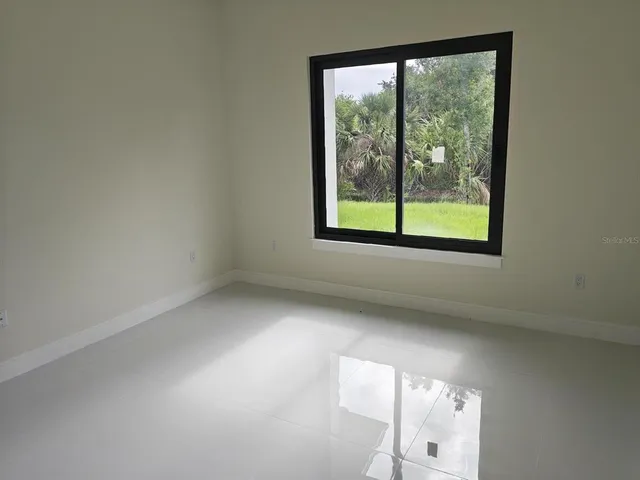 a view of a window in an empty room