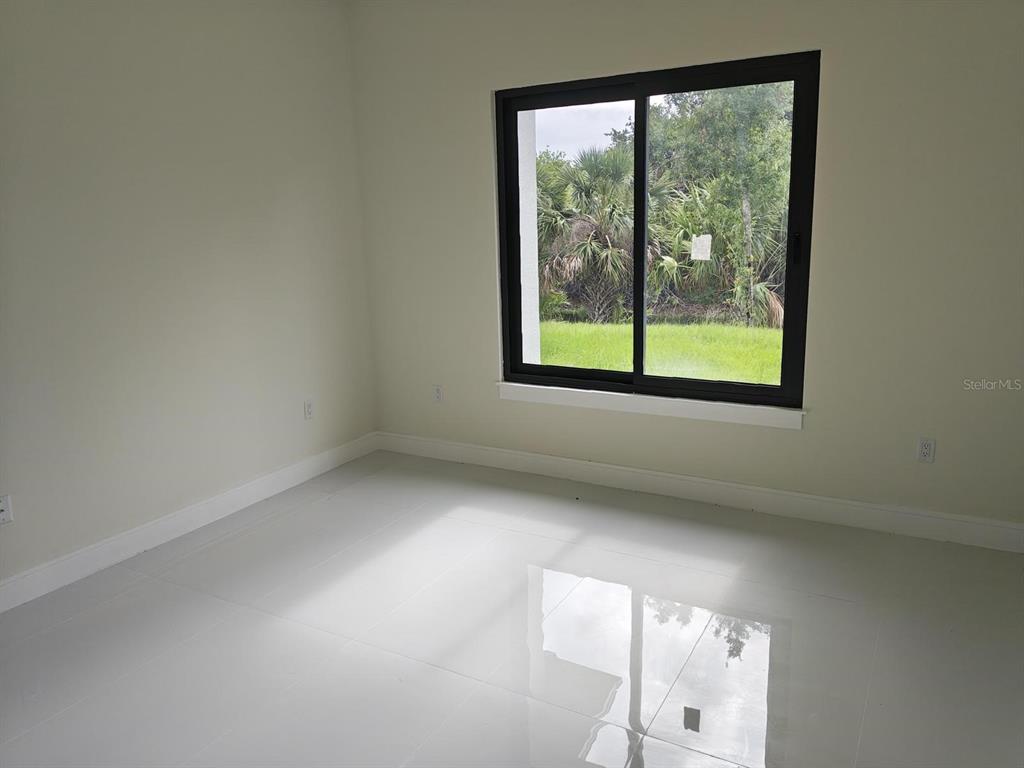 267 Santa Marta Street Port Charlotte, FL 33954 - Photo 8 of 13 a view of a window in an empty room