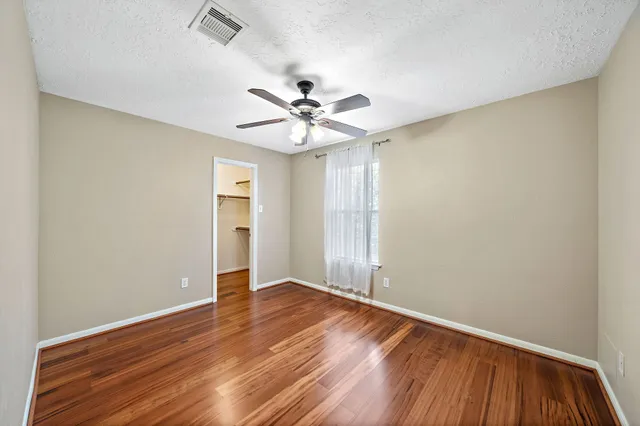 a view of backyard with potted plants