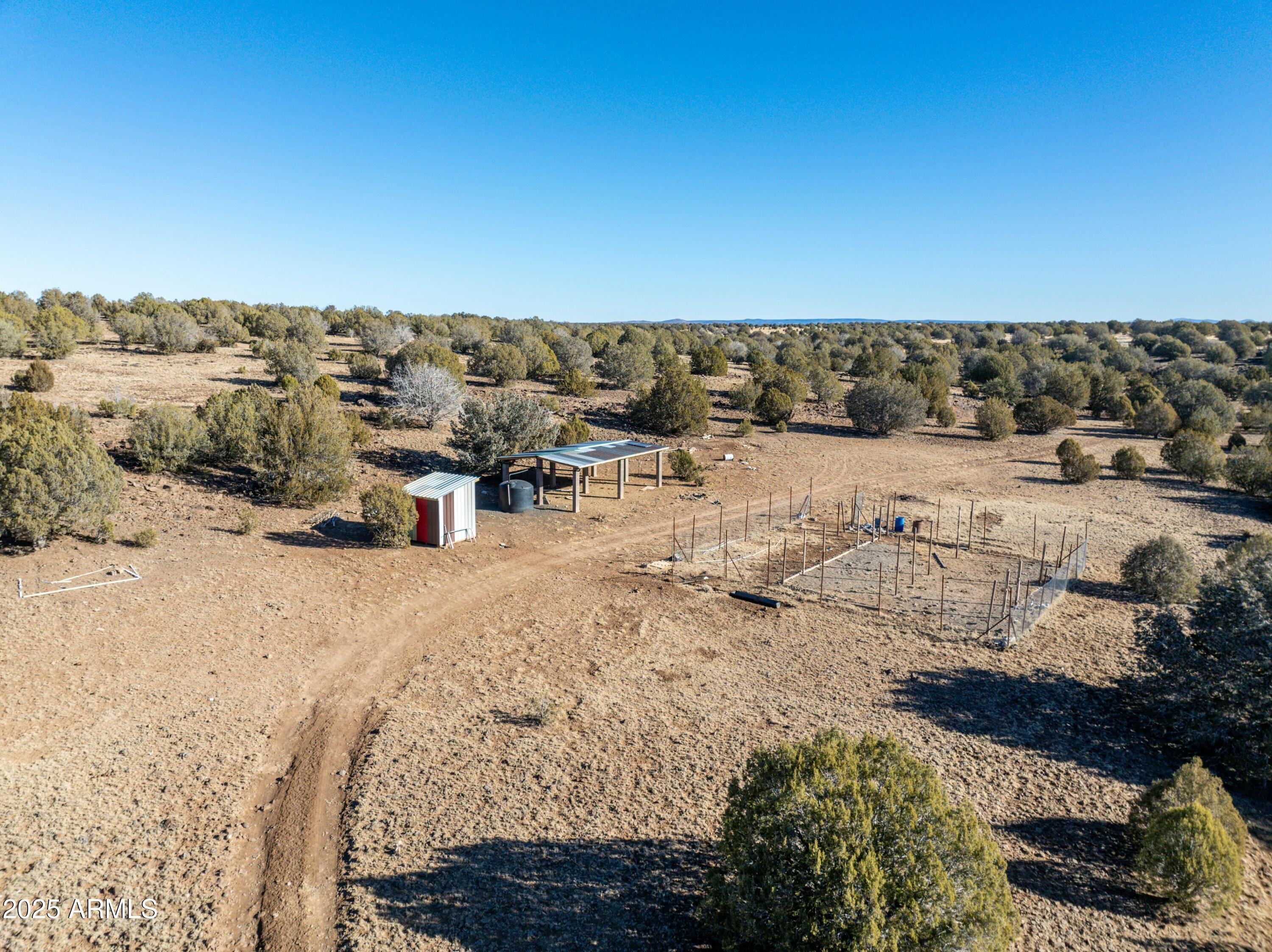 10777 West Raging Crab Road Ash Fork, AZ 86320 - Photo 24 of 45 Garden area and hay storage